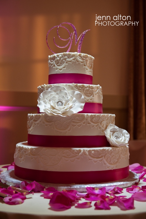 Pink accented wedding cake
