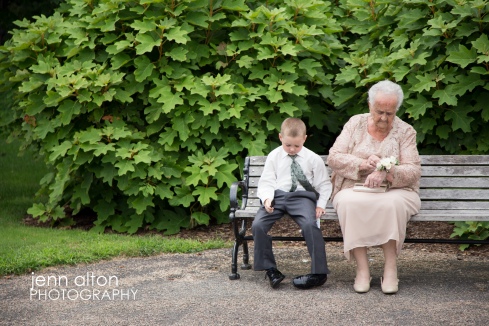 Candid family photo, grandmother and nephew on bench