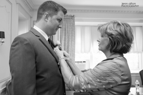 Groom and Groom's Mother attaching boutonniere, Henderson House